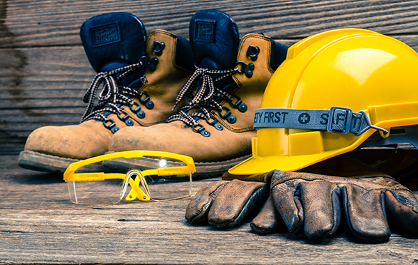 Safety boots, a hard hat, gloves, goggles and other safety equipment.