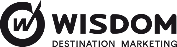 Wisdom Destination Marketing logo.