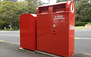 A red, Australia Post mailbox