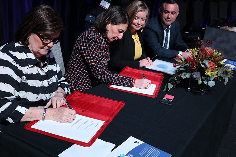 Shelley Hancock, Gladys Berejiklian, Linda Scott and John Barilaro signing the Intergovernmental Agreement in October 2019.