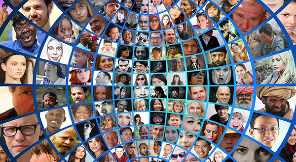 A segmented globe with people's faces inserted into the segments.