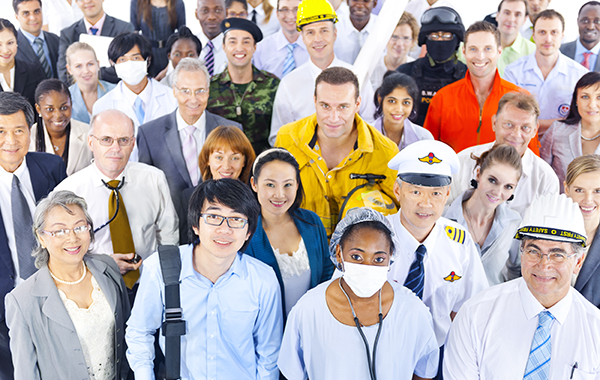 People from all kinds of employment backgrounds stand crowded together.